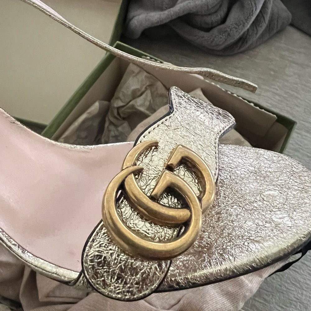 Gently worn gold Gucci heels
